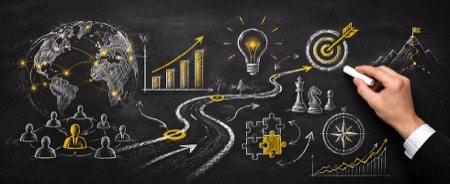 Business strategy and global connections illustrated on a chalkboard